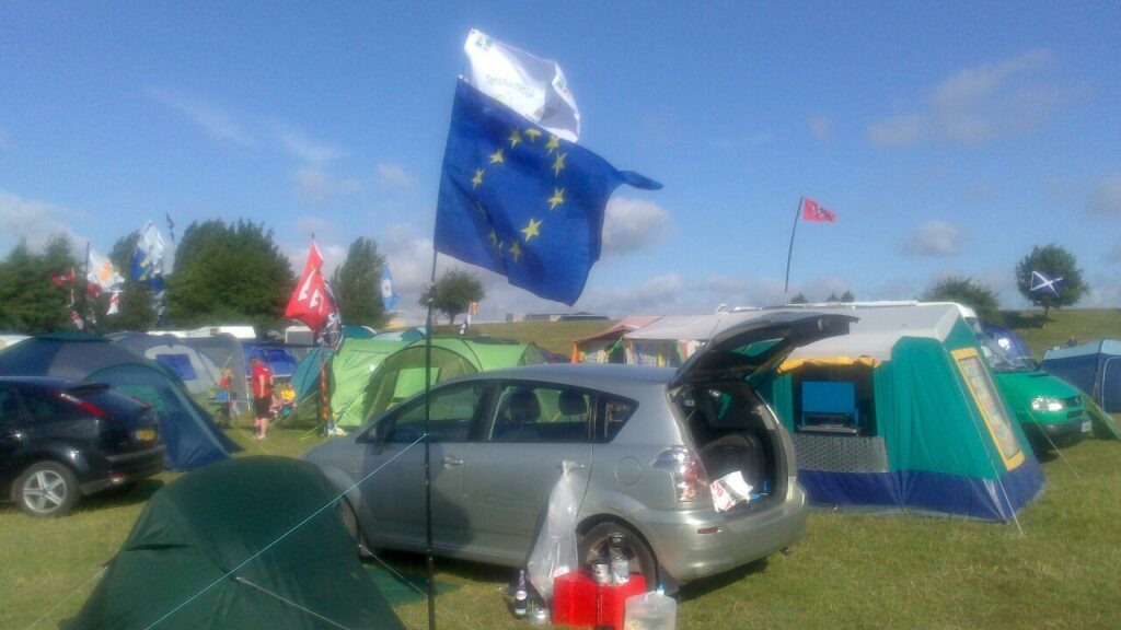 Tentmantent's tent and flags at the 2013 Mega campsite